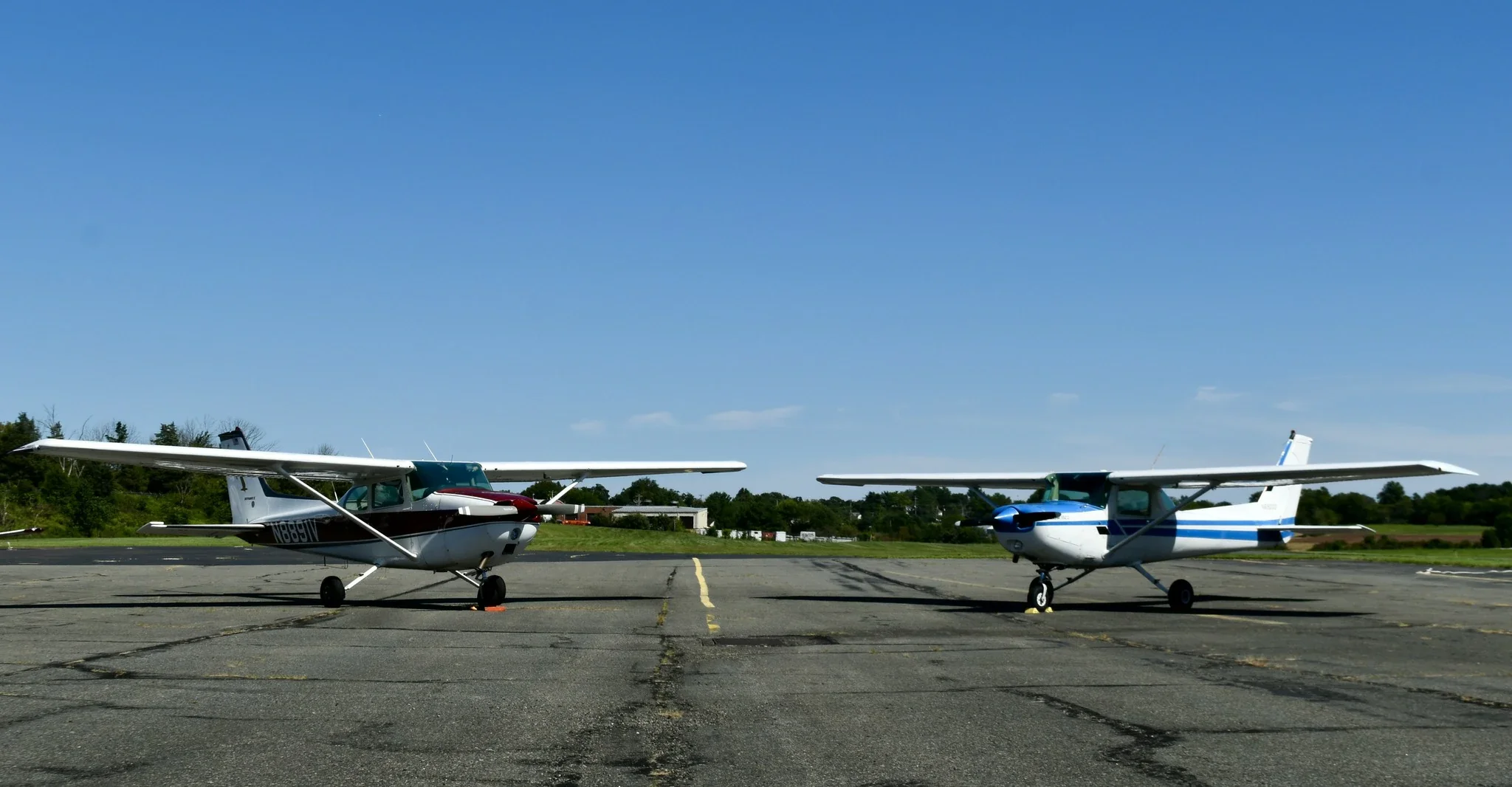 Pitcairn Flight Academy training fleet parked in front of hangar