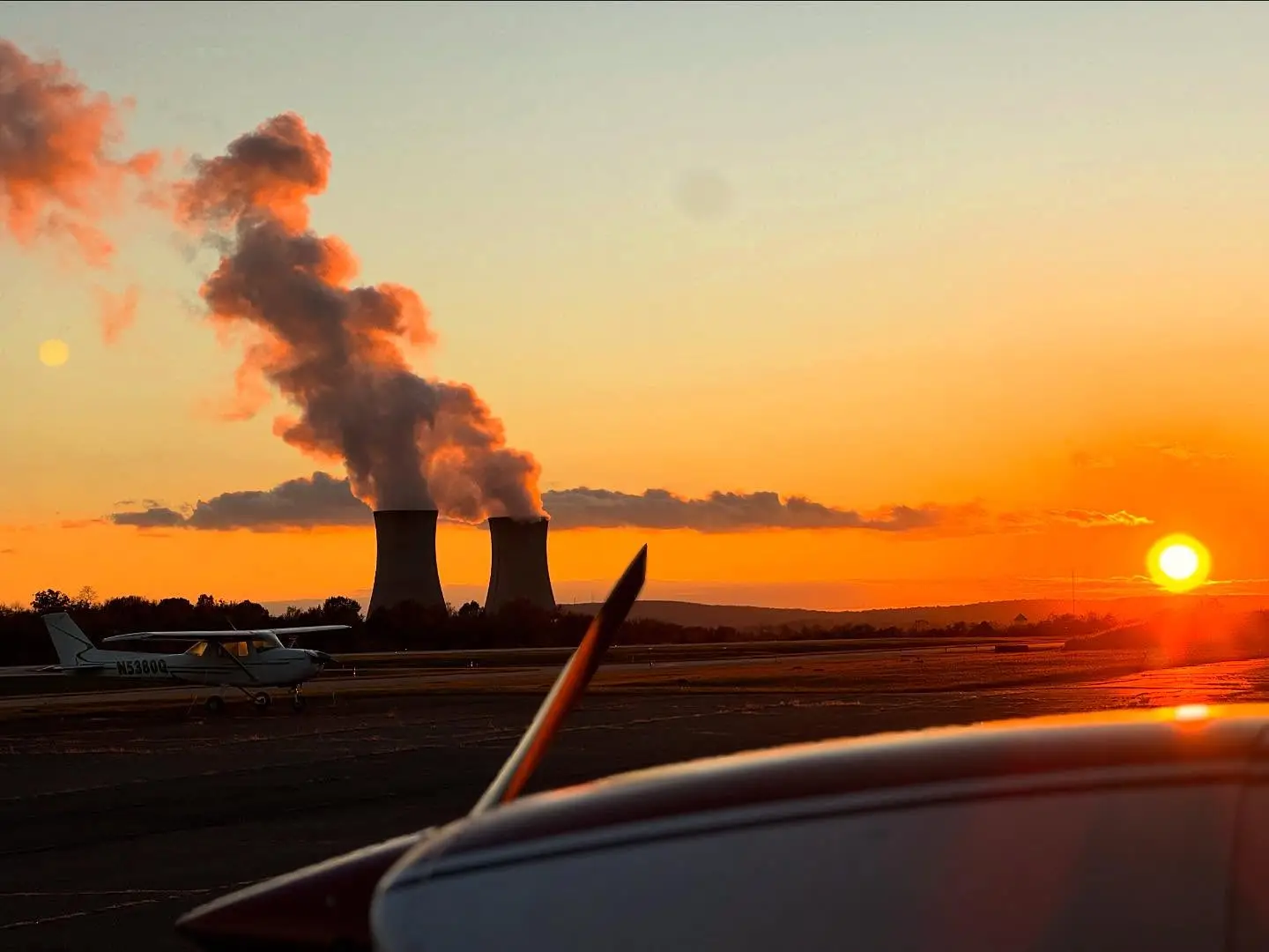 Factory sunset with plane propeller landscape at Pitcairn Flight Academy in Pottstown, PA