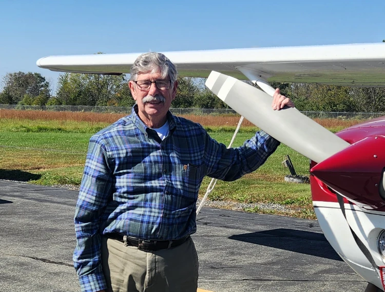 Pilot in front of plane